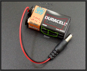 Image of a 9-Volt battery, annotated to show where features of the operator console could be